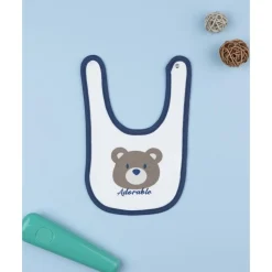 Babero de bebé azul con osito