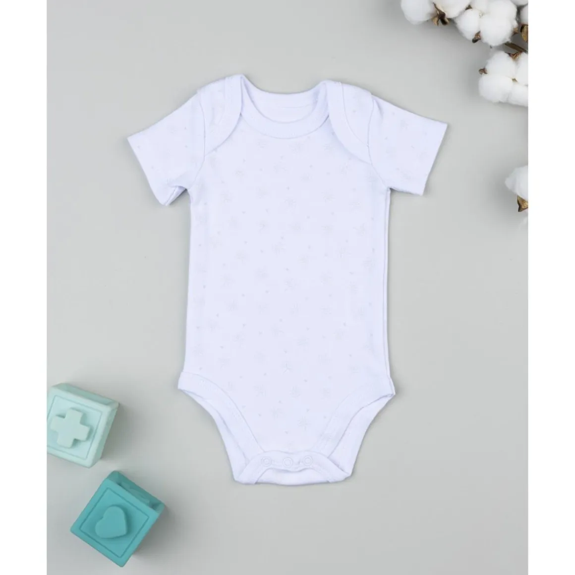 Body de bebé blanco con estampado integral