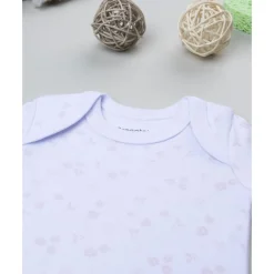 Body de bebé blanco con flores estampadas