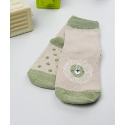 Calcetines antideslizantes niño beige león