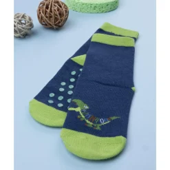 Calcetines antideslizantes azul con dinosaurio