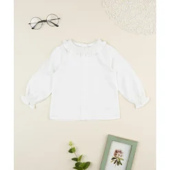 Camisa blanca de niña con volante
