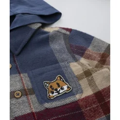 Camisa de franela multicolor con capucha para niño