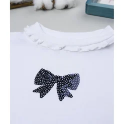 Camiseta cuello alto niña blanca con lazo