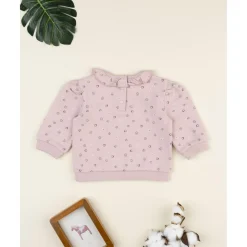 Camiseta rosa de niña con corazones y volantes
