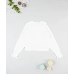 Cardigan blanco con bordados para niña
