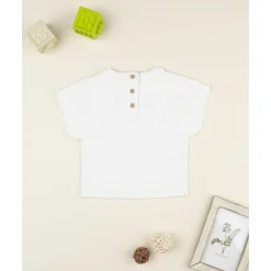 Chaleco de niña blanco bordado