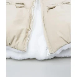 Chaqueta beige con lazos para niña