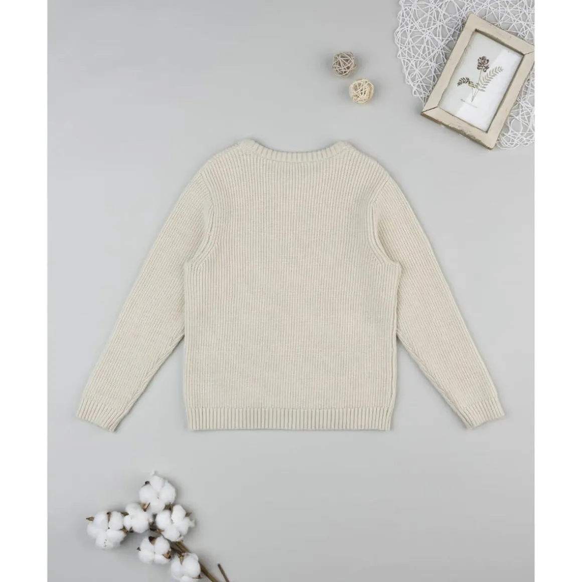 Jersey de niño beige con bolsillo