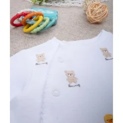 Mono unisex sonrisa bordados por todas partes