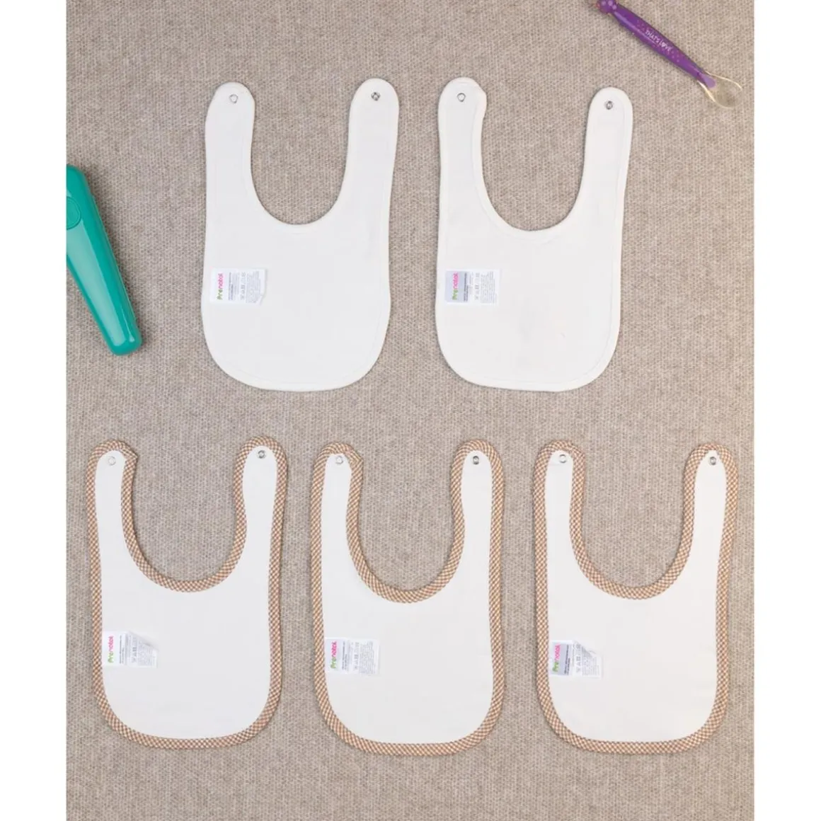 Pack x5 baberos interlock