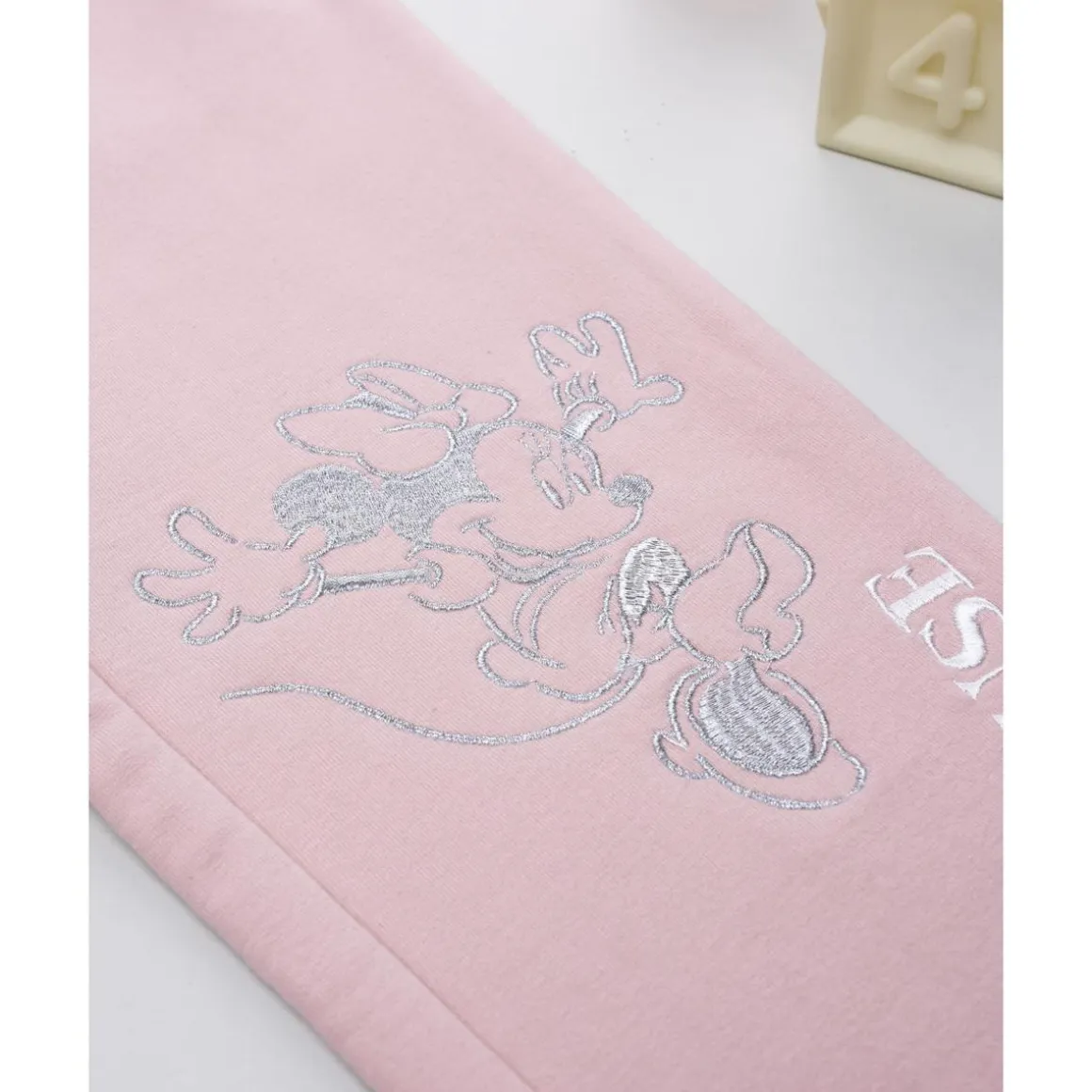 Pantalón rosa para niña con estampado de Minnie