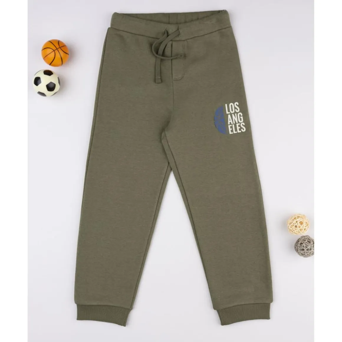 Pantalón verde con estampado para niño