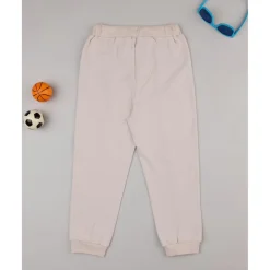 Pantalones niño beige dinosaurios