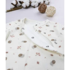 Pelele de niña con caracoles estampados