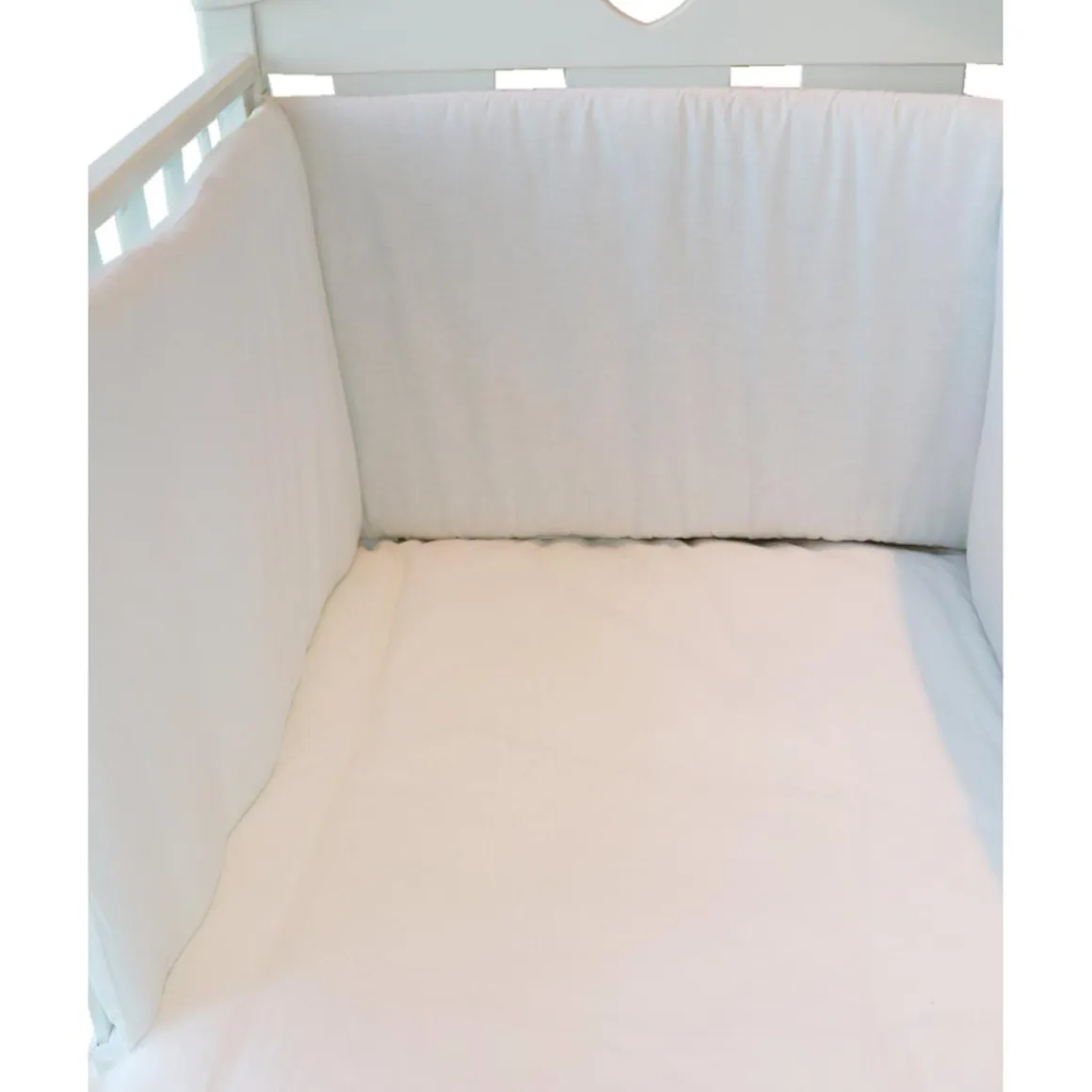 Protector de cuna de algodón blanco