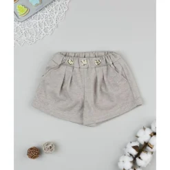 Shorts de niña beige con corazones de strass