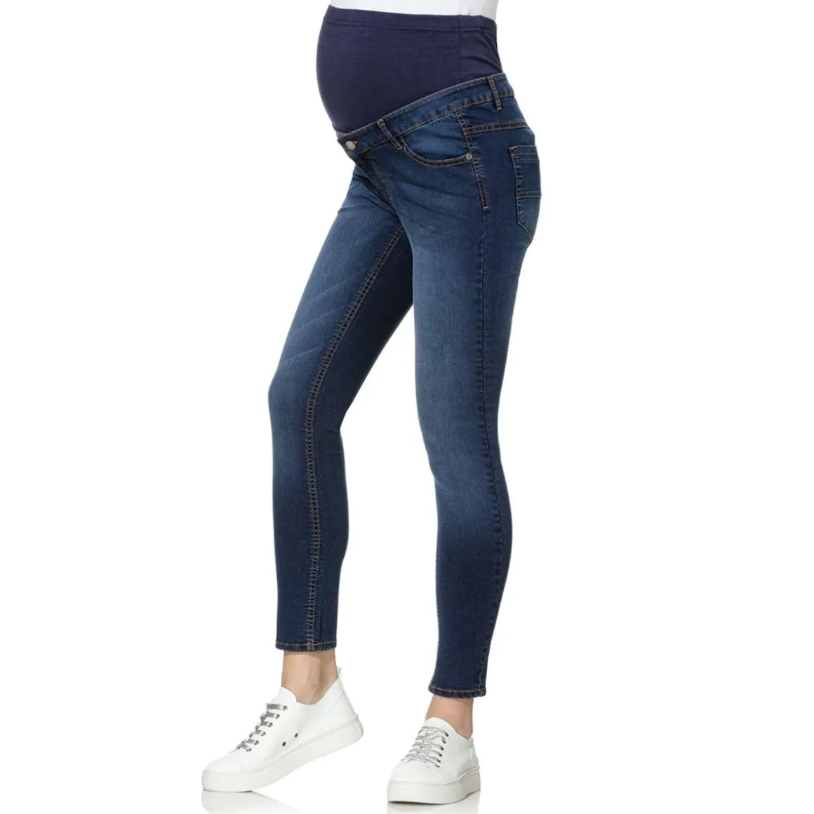 Vaqueros premamá en denim elástico con banda alta en la cintura